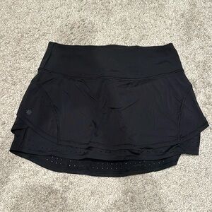 Athleta black skort. Size small. Like new. Pocket on back of waistband.